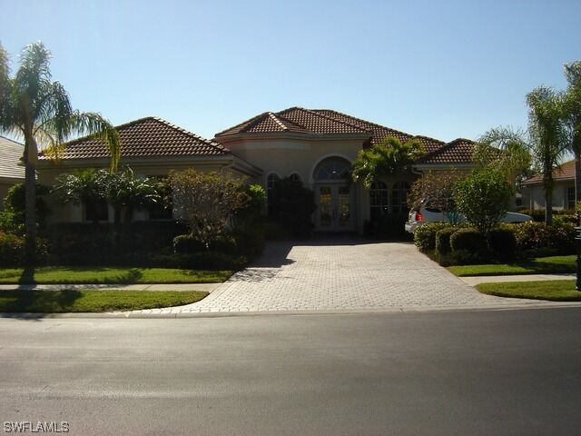 Property Photo: 15928 Los Olivos Lane FL 34110-2812