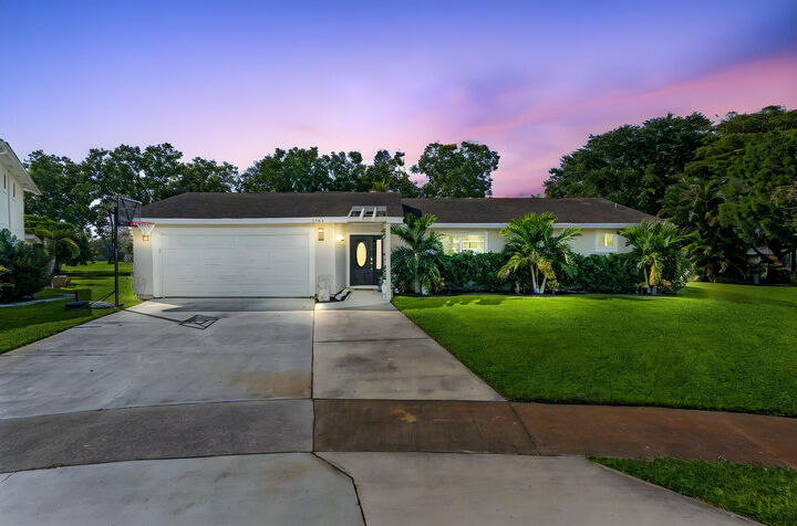 Property Photo:  1408 Old Cypress Trail  FL 33414 