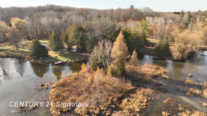Property Photo:  3444 Lakeshore Lane  MI 48624 