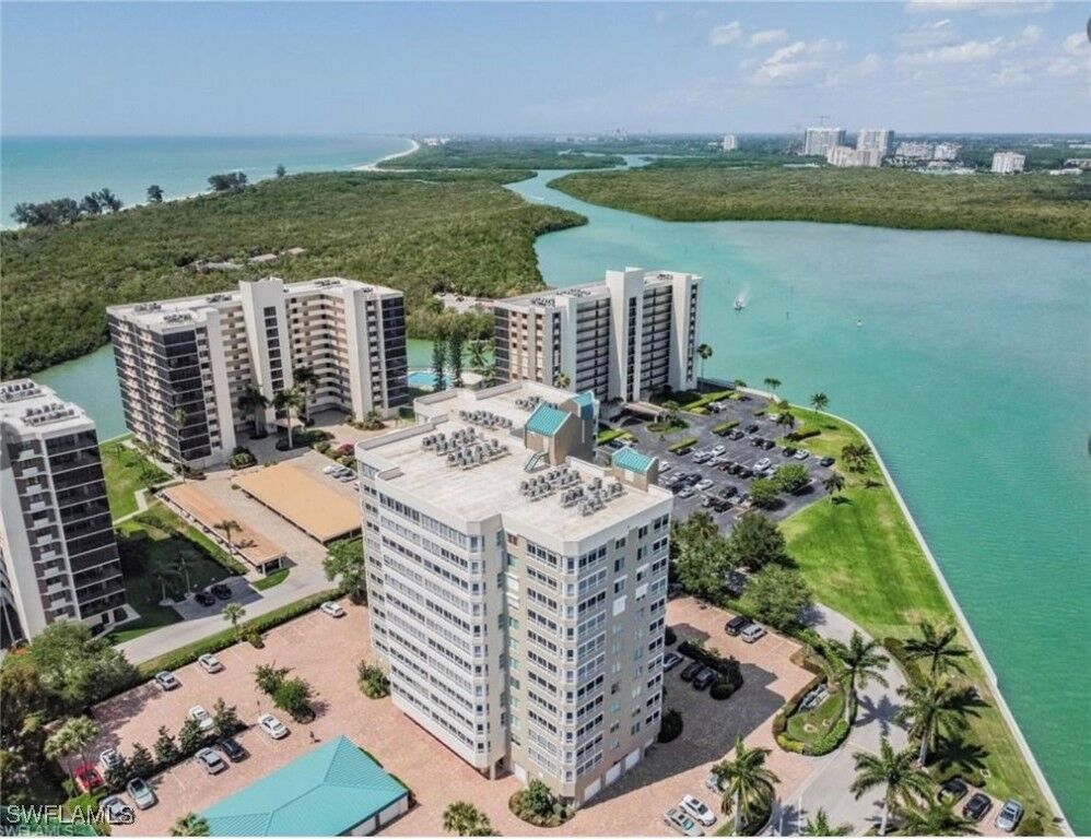 Property Photo:  21 Bluebill Avenue 1103  FL 34108 