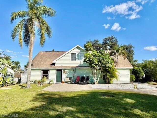 Property Photo: 27673 Los Amigos Ln FL 34135