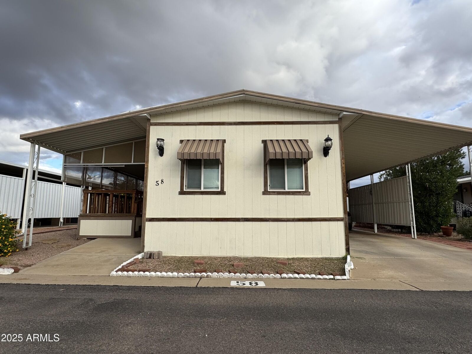Property Photo:  8600 E Broadway Road 58  AZ 85208 
