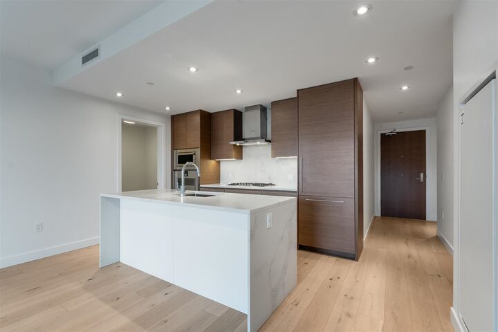 Property Photo:  5693 Elizabeth Street 207  BC V5Y 3K1 