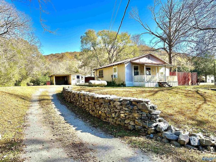 Property Photo:  140 Happiness Drive  AL 35768 