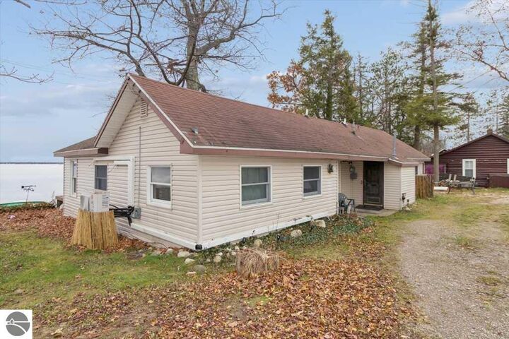 Property Photo:  6480 Paradise Trail  MI 49718 