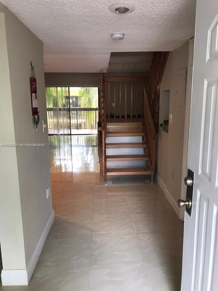 Property Photo:  8859 SW 131st Ct 203  FL 33186 