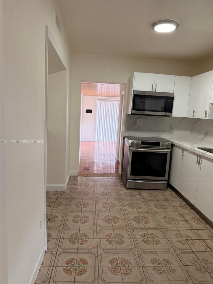 Property Photo:  791 E 21st St  FL 33013 