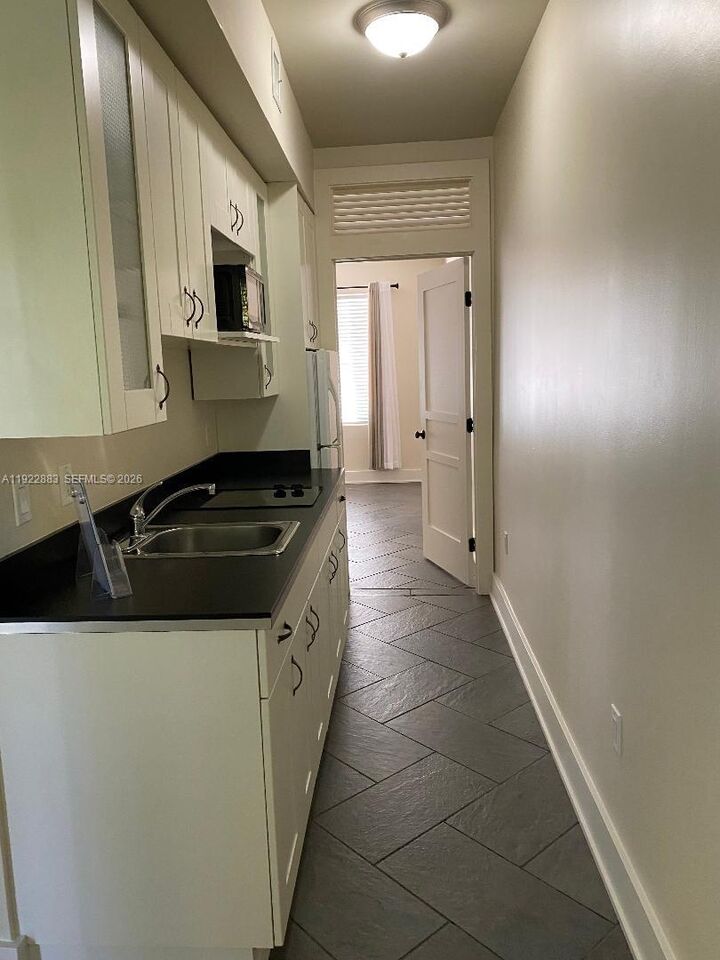 Property Photo:  119 Cibao Ct 3  FL 33134 