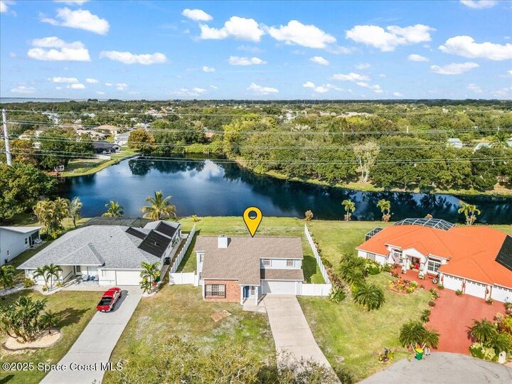 Property Photo:  320 Raquette Court  FL 32953 