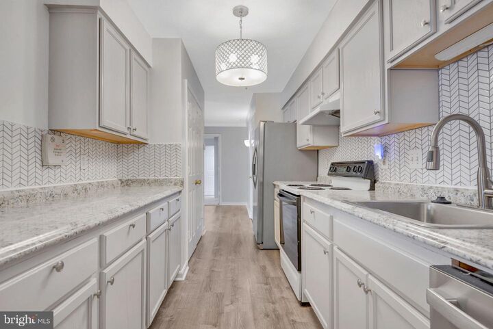 Property Photo: 3710 Excalibur Court 103 MD 20716