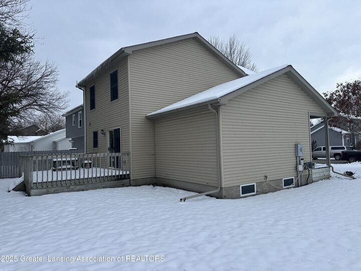 Property Photo:  1150 Porter Drive  MI 48813 