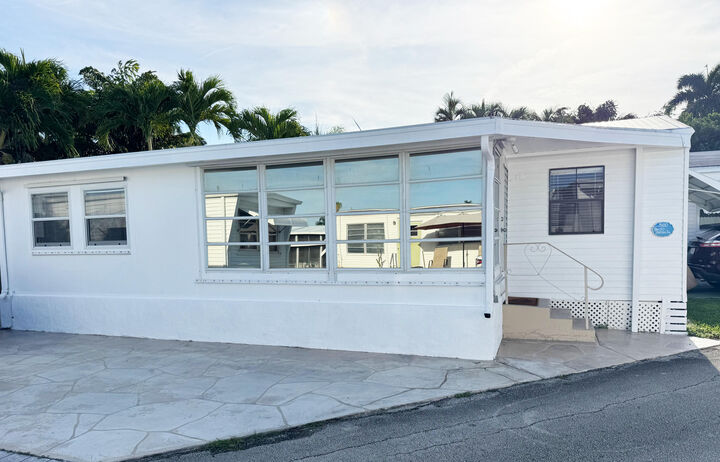 Property Photo: 210 Cardinal Drive B FL 33435