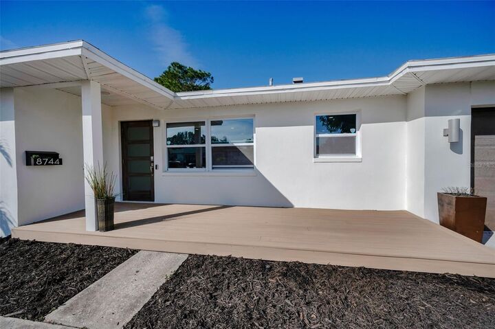 Property Photo: 8744 Sunlit Cove Drive NE FL 33702