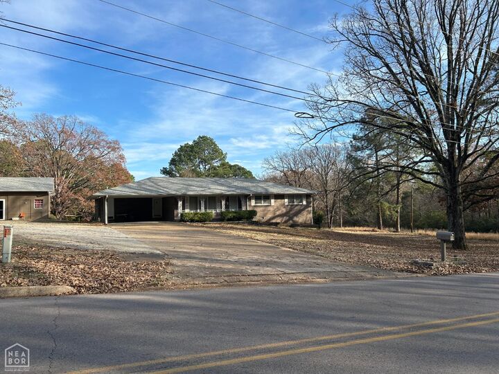 Property Photo:  1008 N Caraway Road  AR 72401 