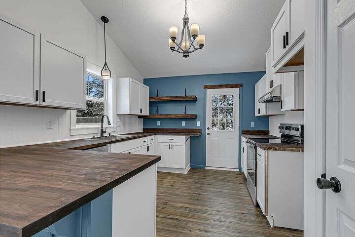 Property Photo:  1202 Blossom Boulevard NW  MN 55040 