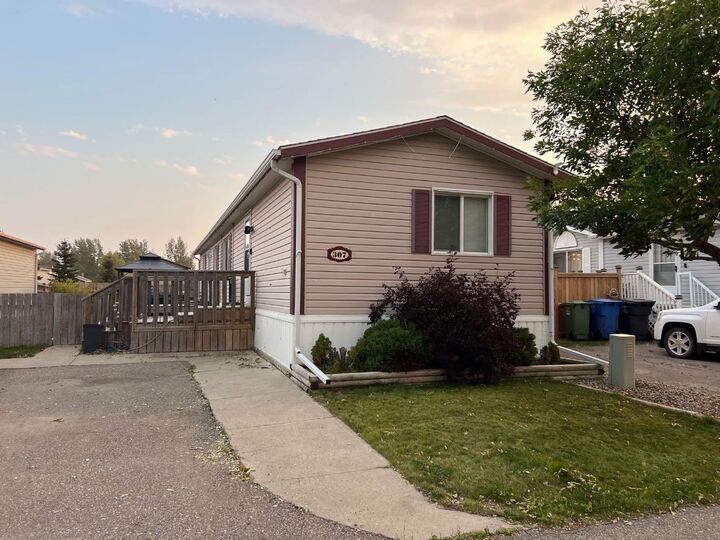 Property Photo: 307 Spurline Avenue AB T1M 0B1