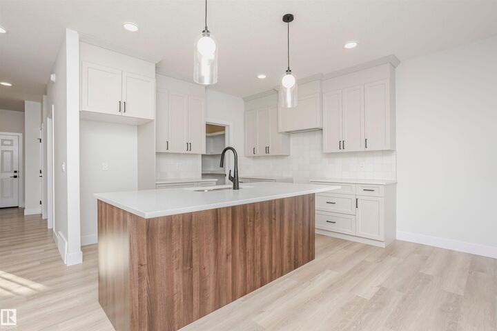 Property Photo: 6302 Dansereau Crescent AB T4X 3E1