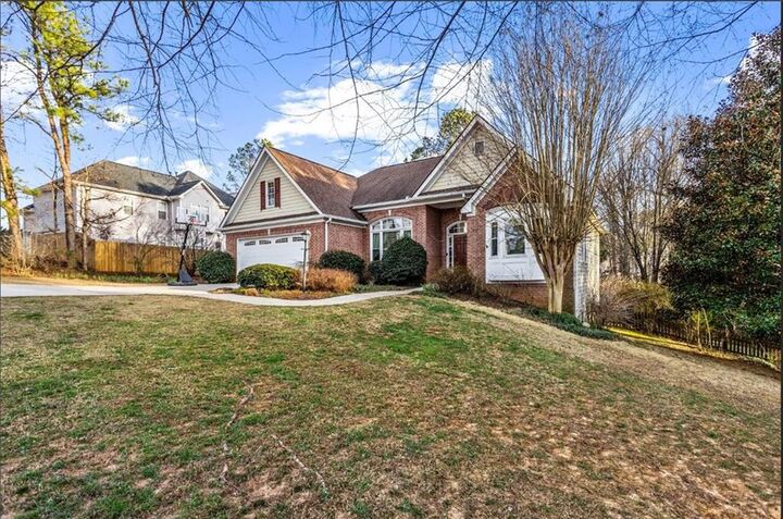 Property Photo:  635 Piping Rock Point  GA 30043 