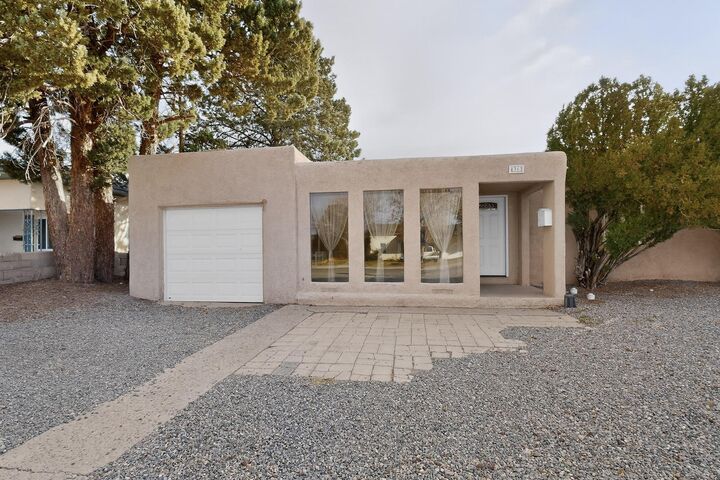 Property Photo:  436 General Chennault Street NE  NM 87123 