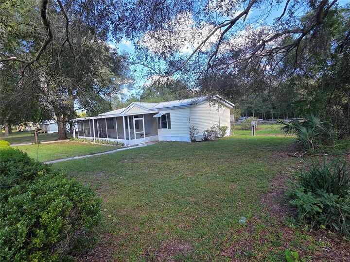 Property Photo:  26616 June Avenue  FL 32736 