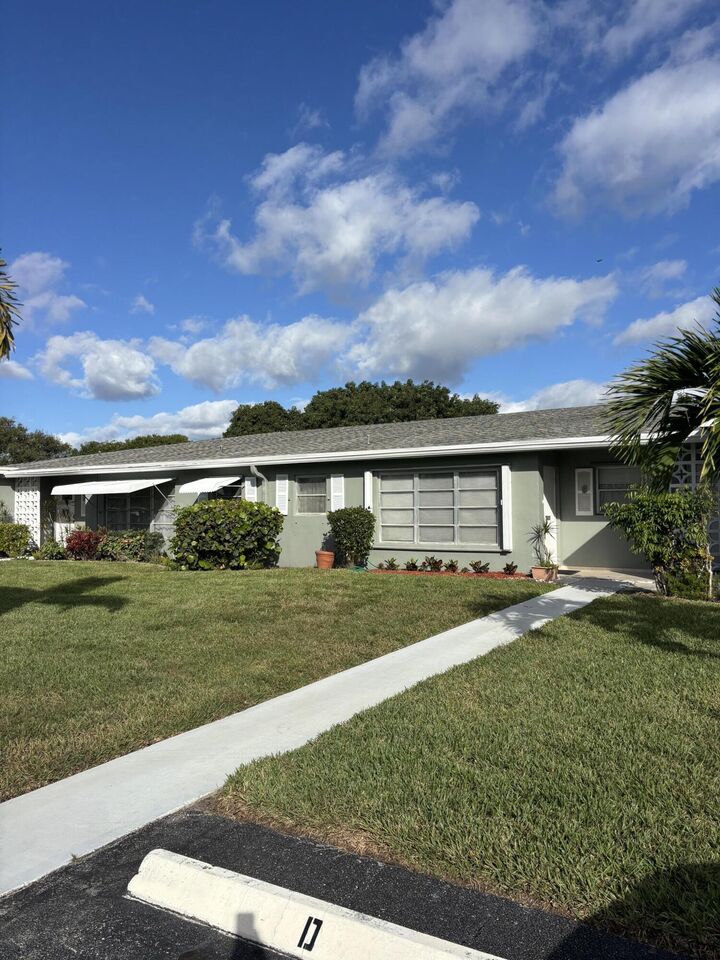 Property Photo:  707 High Point Boulevard N C  FL 33445 