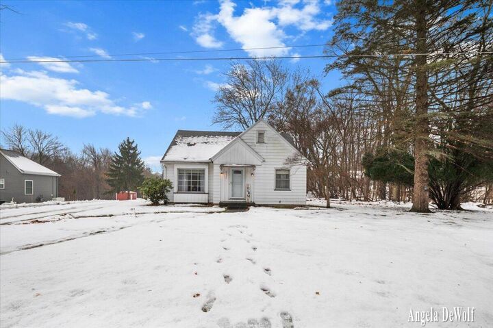 Property Photo:  8634 Division Court SE  MI 49315 