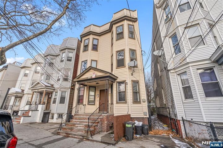 Property Photo:  114 Neptune Avenue  NJ 07305 