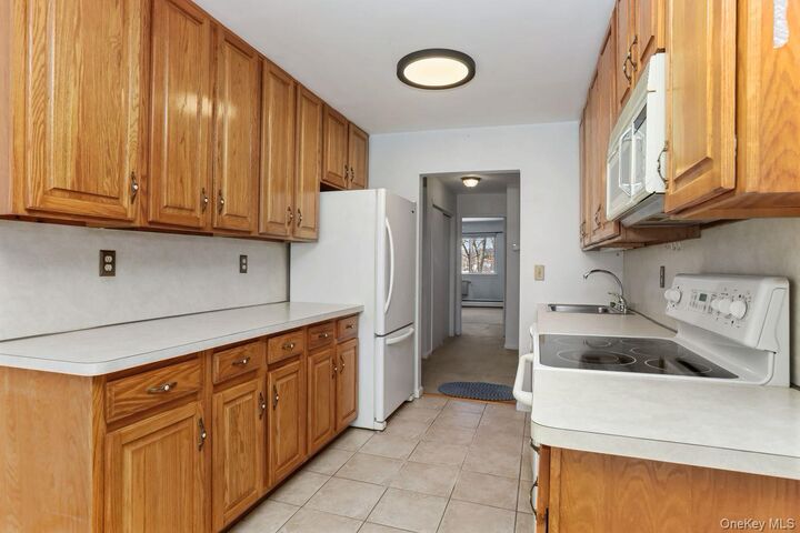 Property Photo:  58 Coachlight Square  NY 10548 