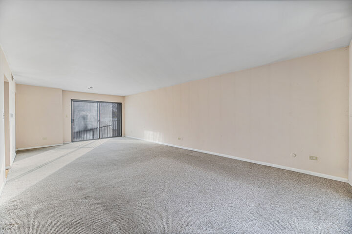 Property Photo:  5019 Mulford Street 201  IL 60077 