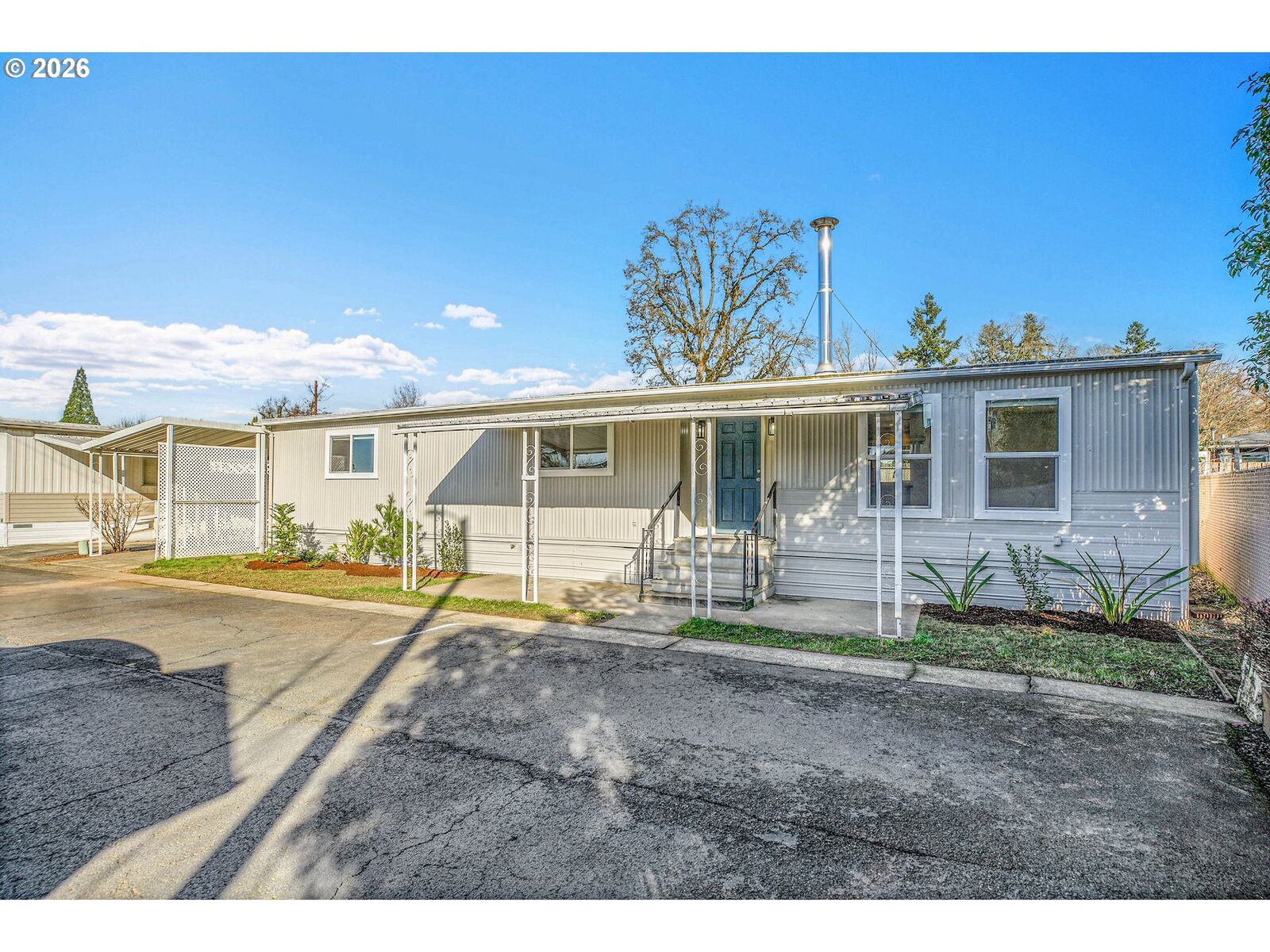 Property Photo:  4400 SE Roethe Rd 51  OR 97267 