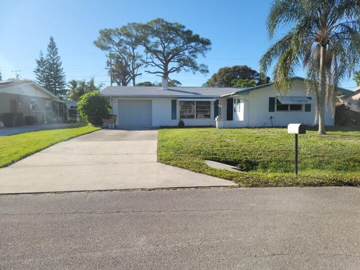 Property Photo:  408 E Coconut Avenue  FL 34952 