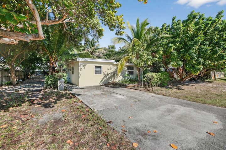 Property Photo:  617 NW 43rd Court  FL 33309 