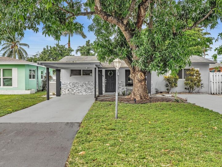 Property Photo:  81 NW 47th Court  FL 33309 