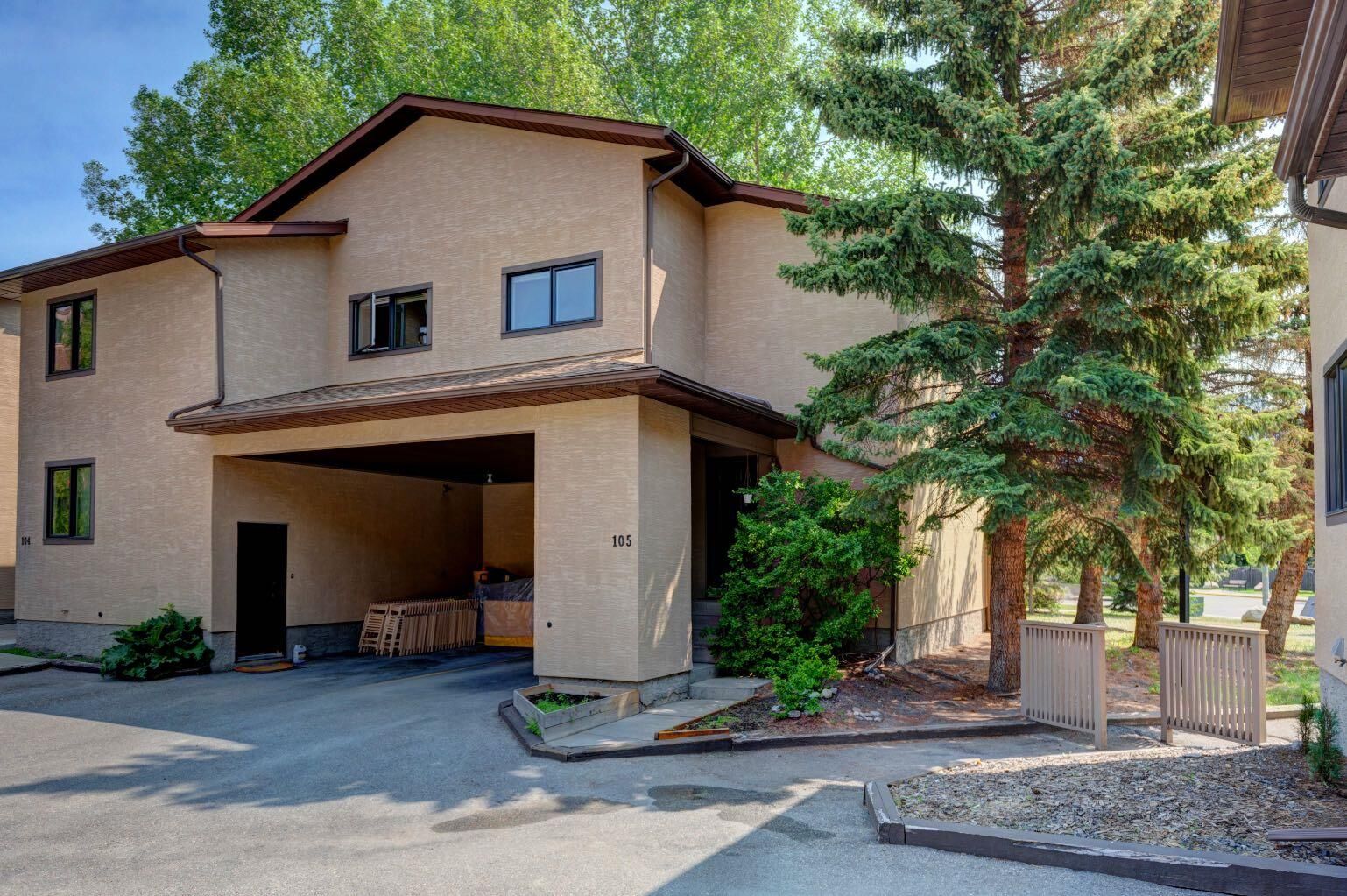 Property Photo: 200 Three Sisters Drive 105 AB T1W 2M1