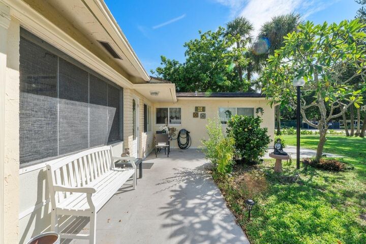 Property Photo:  410 SW Natura Avenue  FL 33441 