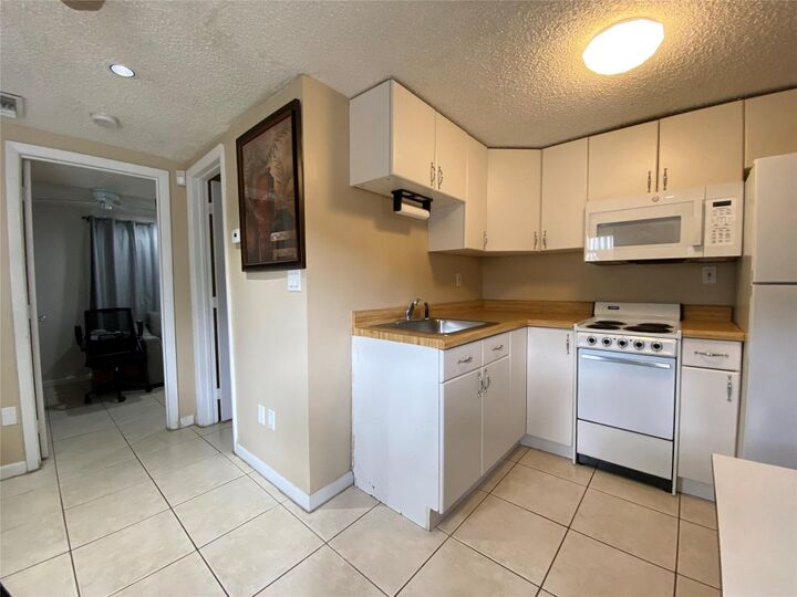 Property Photo:  9600 NW 24th Avenue  FL 33147 