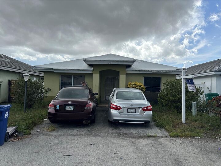 Property Photo:  18476 NW 52nd Path  FL 33055 