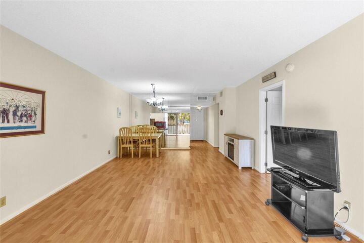 Property Photo:  1015 Country Club Drive 203  FL 33063 