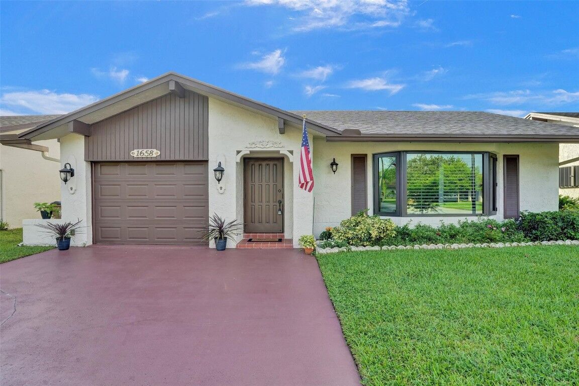 Property Photo:  1658 SW 19th Avenue  FL 33442 