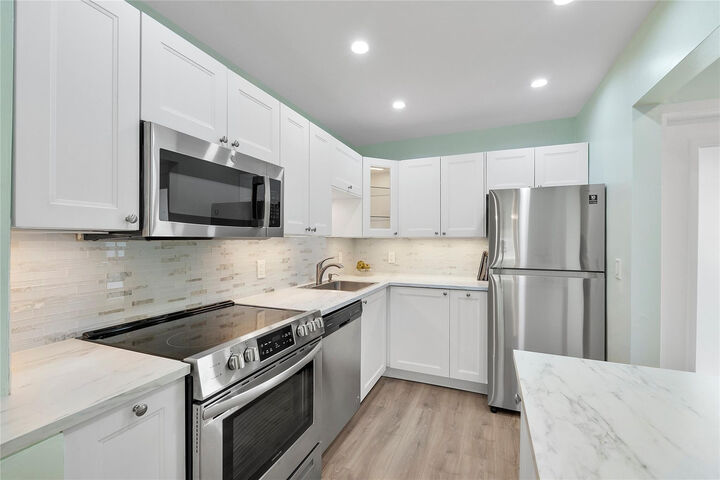 Property Photo:  1951 NE 39th Street 156  FL 33064 