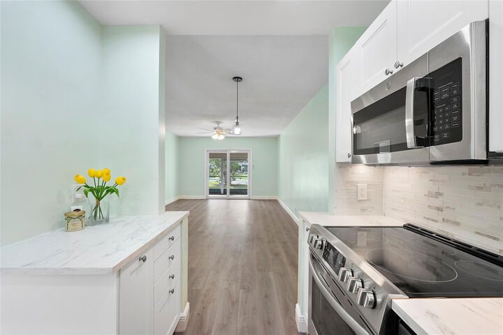 Property Photo:  1951 NE 39th Street 156  FL 33064 