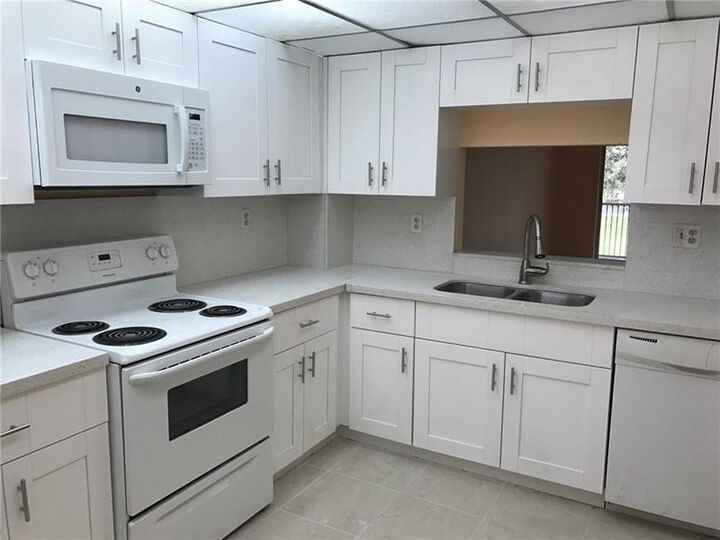 Property Photo:  1075 Riverside Drive 207  FL 33071 