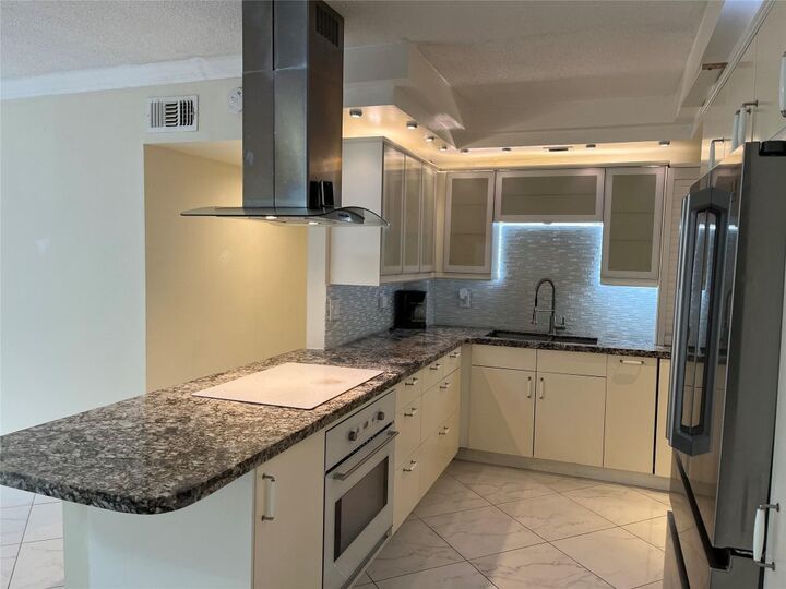 Property Photo:  639 W Oakland Park Boulevard 104-D  FL 33311 