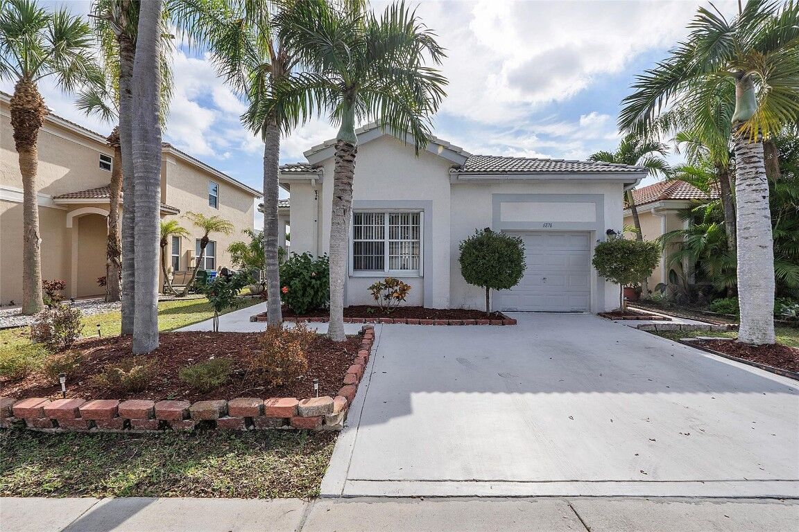 Property Photo:  6876 NW 32nd Street  FL 33063 