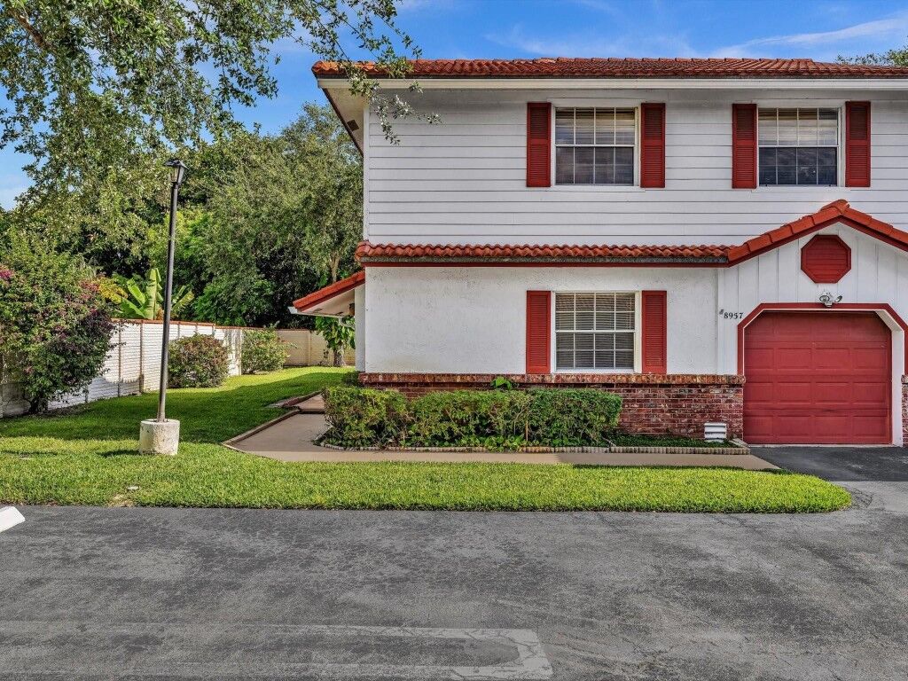 Property Photo:  8957 NW 23rd Street 8957  FL 33065 