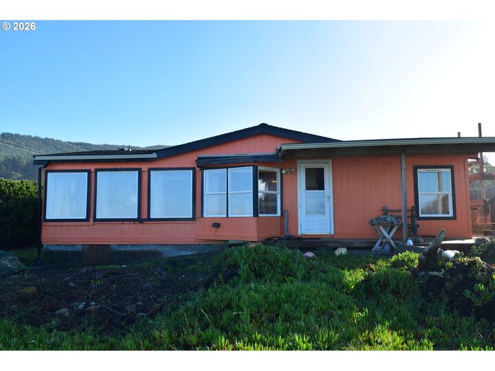 Property Photo: 33130 Nesika Rd A OR 97444