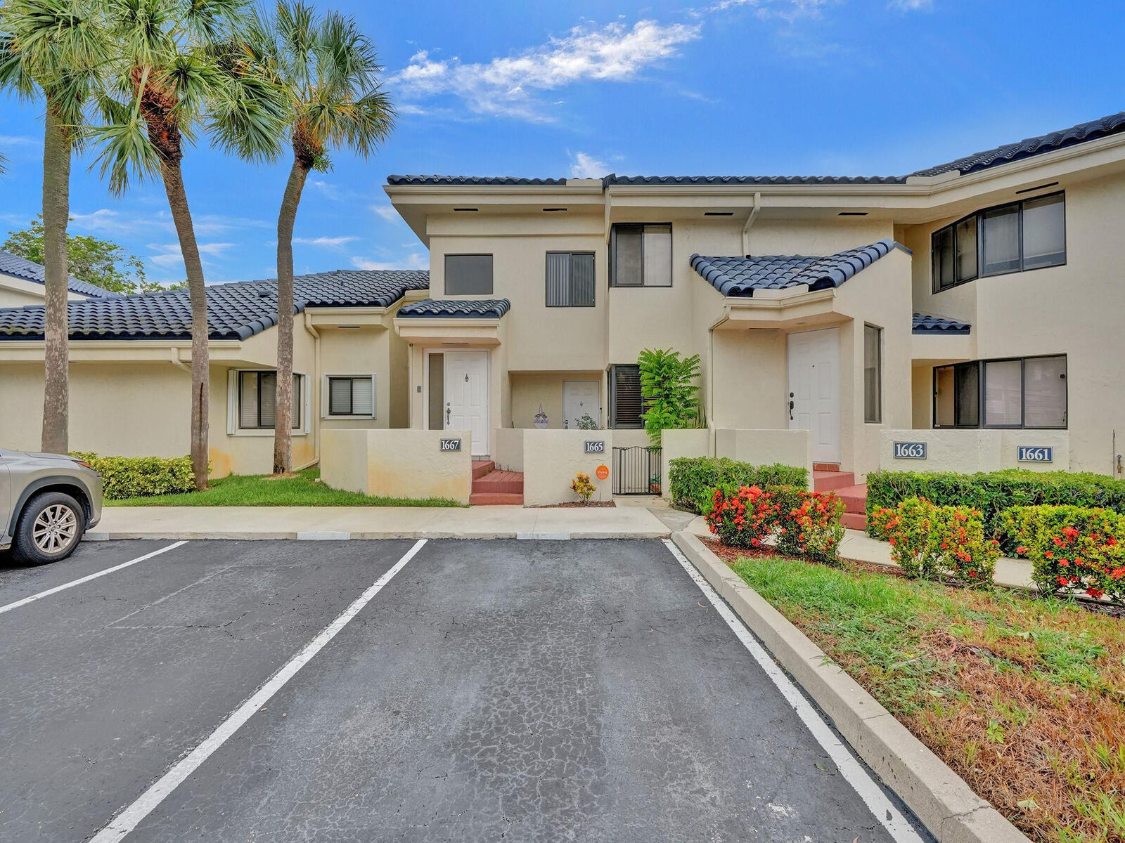 Property Photo:  1665 NW 81st Way 1665  FL 33322 