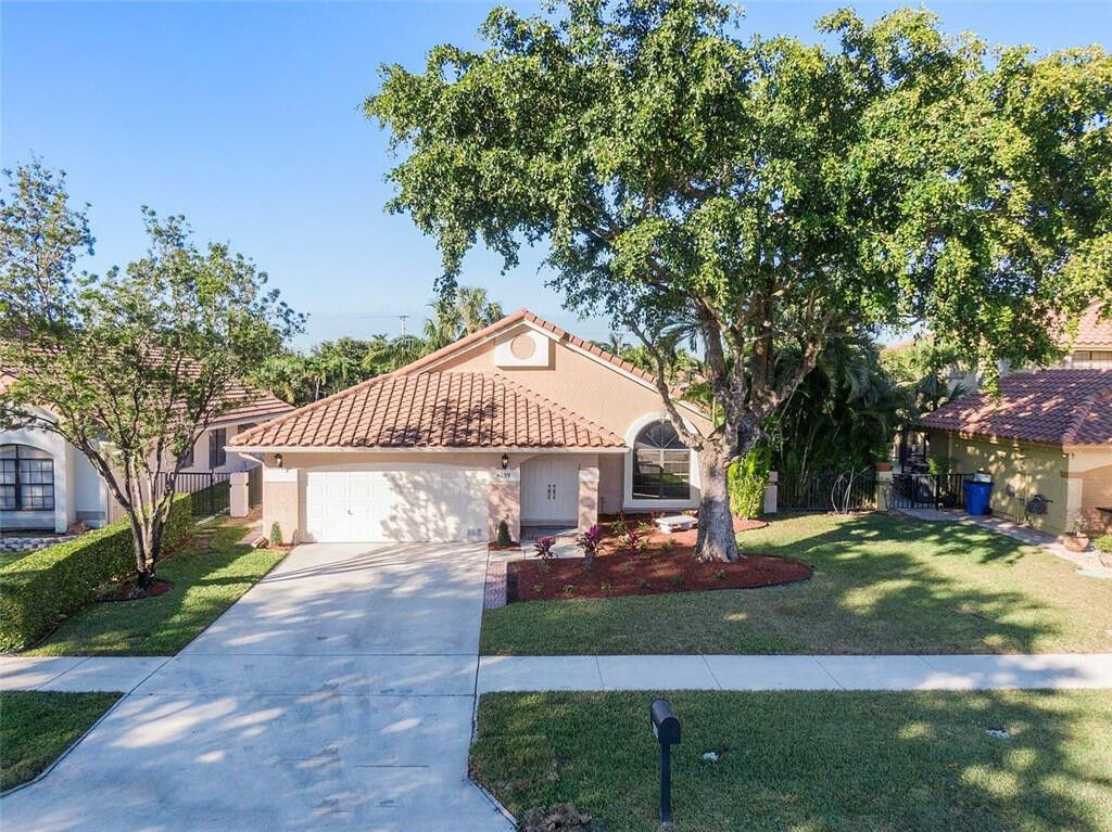 Property Photo:  4039 NW 5th Drive  FL 33442 