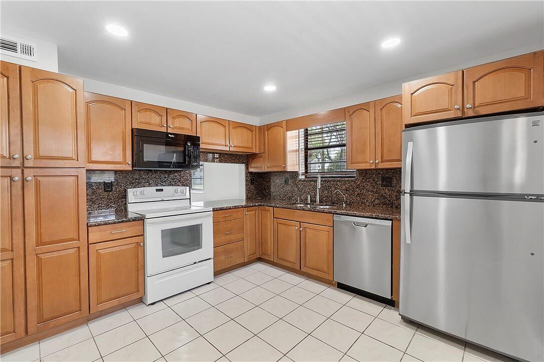 Property Photo:  4950 E Sabal Palm Boulevard 110  FL 33319 