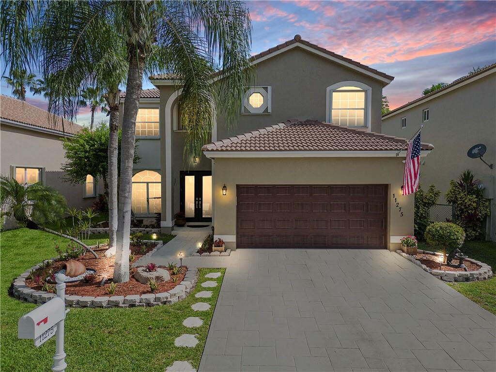 Property Photo: 11275 NW 53rd Court FL 33076
